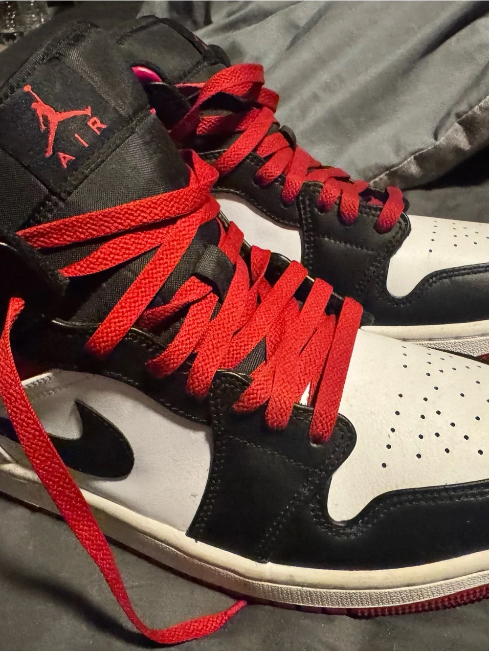 Jordan High-Top Sneakers in Black, White, and Red